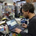 Practitioners working at the Pervasive Media Studio, during Kieron Kirkland's Ma