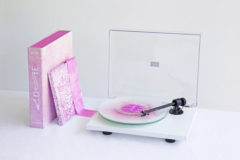 A photo of Bacterial Soundscape Vinyl Record on a record player
