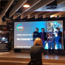 Watershed team on stage receiving award
