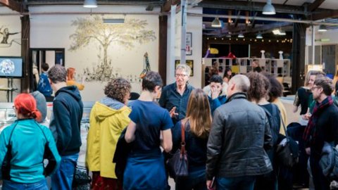 People mingling at an Open Studio Friday event in the PM Studio