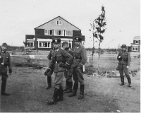A historical image of The Commander’s House and Police Battalion Bremen members, Westerbork, NL, 02/10/1942.