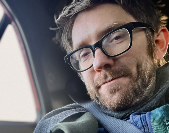 Antony Nasce, beardy man, with glasses.