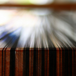 threads dark threads on a table, ready for weaving