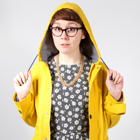 Lily looking delightful in a yellow coat