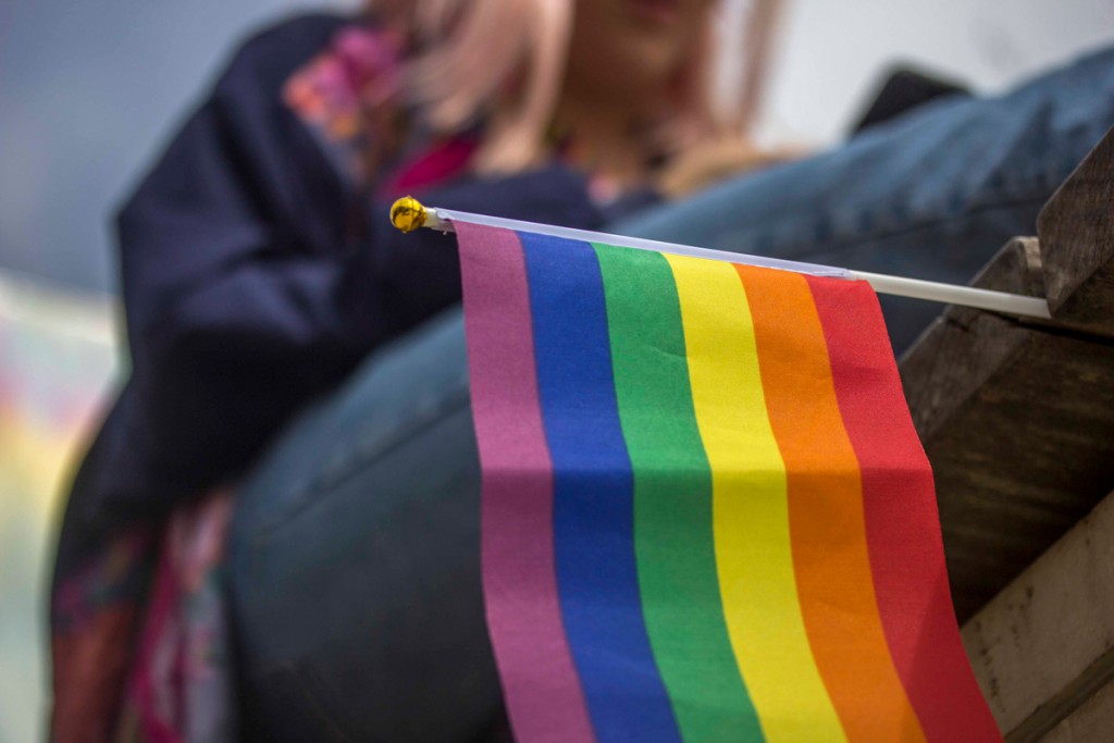 Imogen sat above the Pride flag.