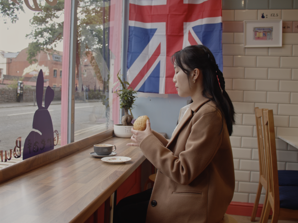 Hong Kong bakery scene from the ‘Memories, Linger’ music video.