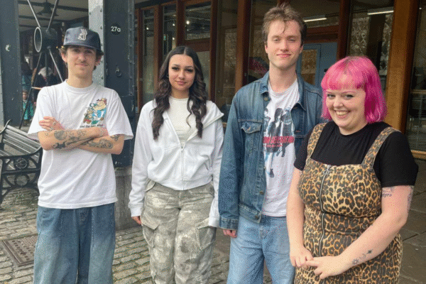 Four under-25s stood outside watershed