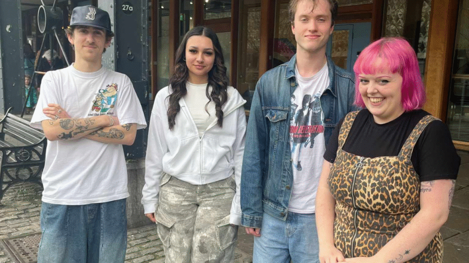 Four under-25s stood outside watershed