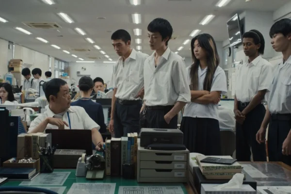 A group of people stood an office