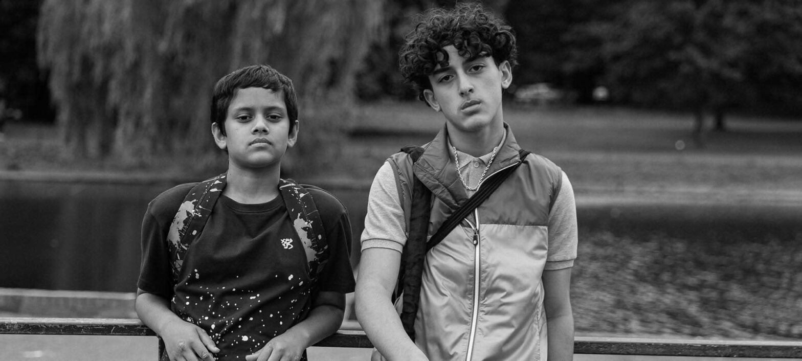 Ish film still - two boys posing to the camera