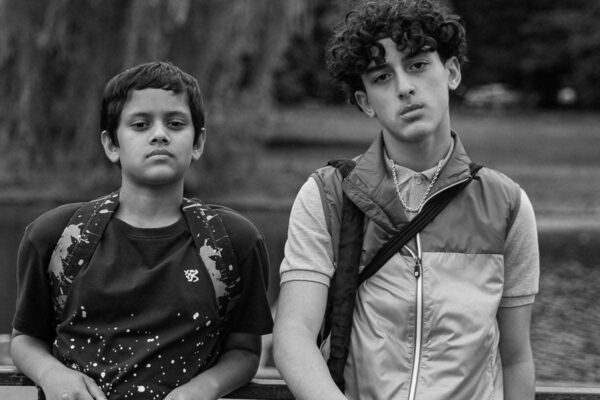 Ish film still - two boys posing to the camera