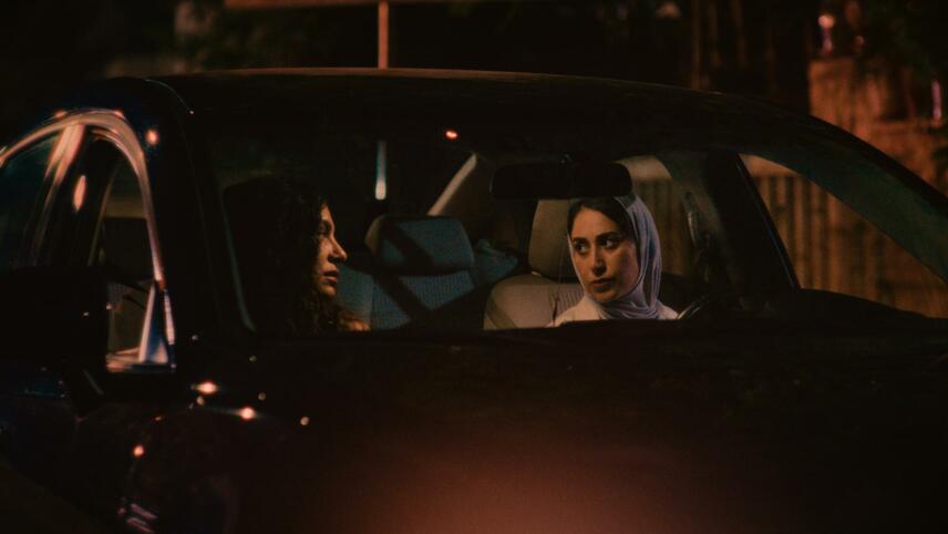 Still from Coyotes - two women talking in a car.