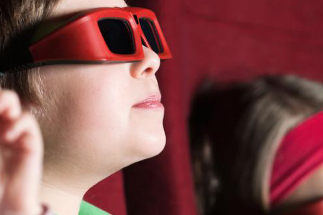 Photo of a boy wearing 3d glasses