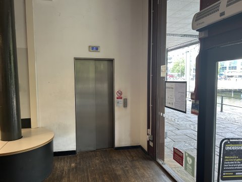 Photo of the lift on the ground floor by Box Office.
