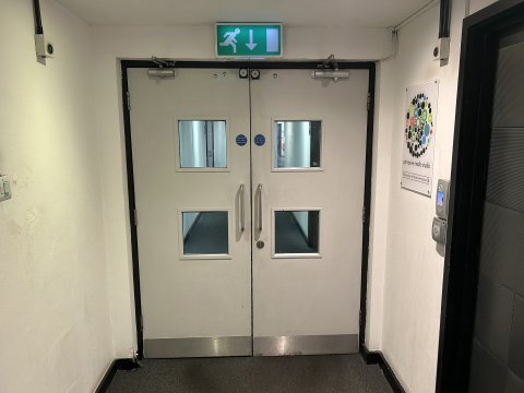 Photo of the double doors that head to the Pervasive Media Studio.