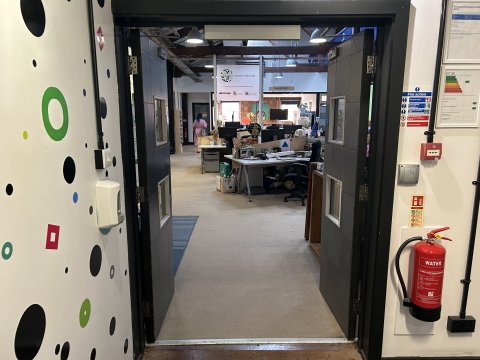 Photo of the open double doors heading to the Pervasive Media Studio.