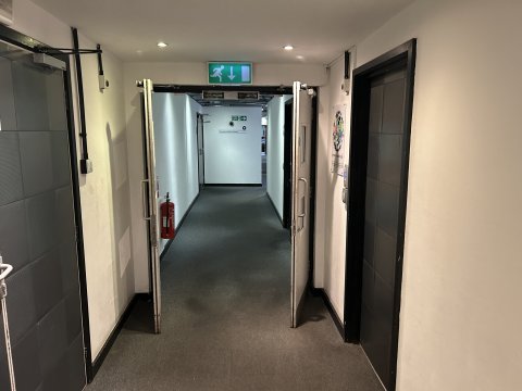 The first set of double doors open towards the Pervasive Media Studio.