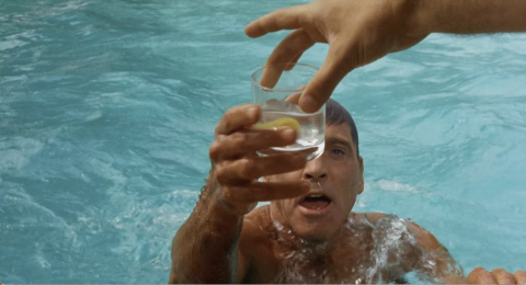 Film still from The Swimmer