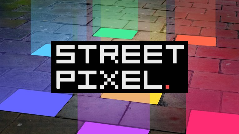 Illuminated pavement slabs. The name: Street Pixel sits mid-frame.