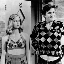 Film still from the Film The Last Picture Show of a man and a woman standing next to each other