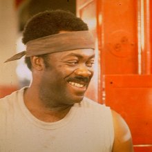 Head shot of actor Yaphet Kotto, 1970s feel to the image with the man smiling