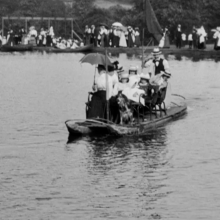 an image of people on a boat taken from Trip to Sunny Vale Gardens at Hipperholme (1901) 