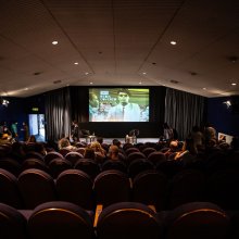 an image of people sitting for a Cinema Rediscovered event 