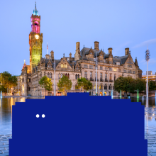 A big blue character is in the middle of Bradford city centre.