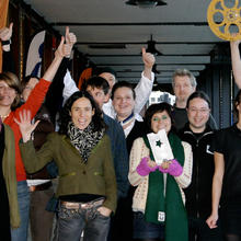 Watershed staff outside Watershed celebrating their Europa Cinemas award