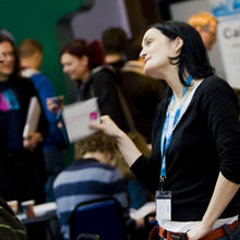 A woman talking at a Watershed event 