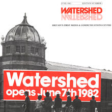 Watershed building with the date it opened across the image.