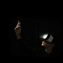 Person dancing with VR headset on