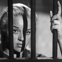 Diana Dors behind bars in Yield to the Night