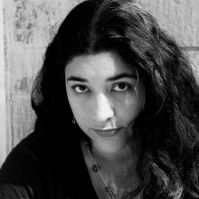 Black and white profile photo of Lorena Pino