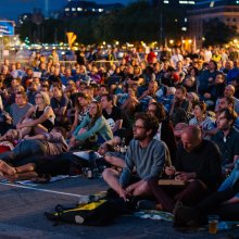 Audience watching an outdoor film screening