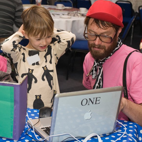 Photo of child and adult at a Watershed family workshop