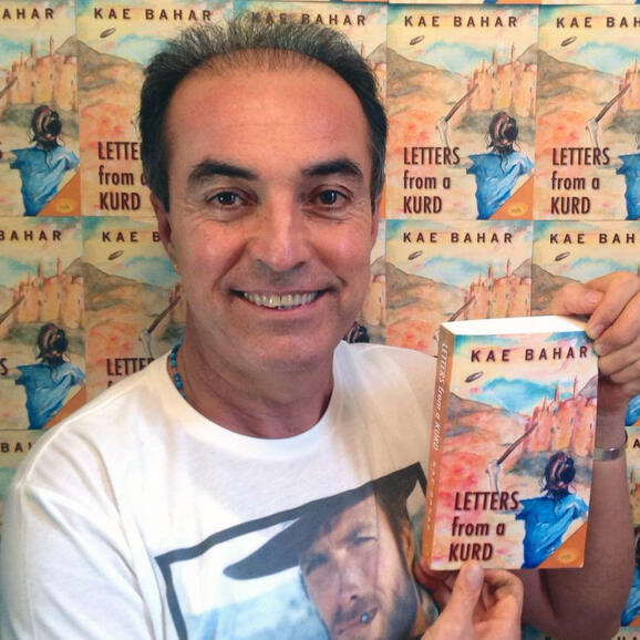 Kae Bahar with his book Kae Bahar with his book