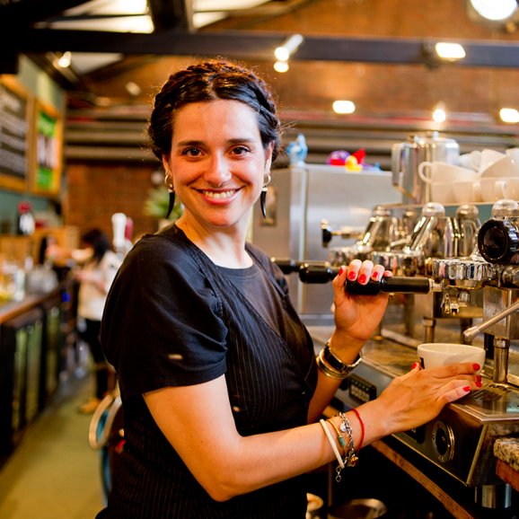 Photo of Watershed Cafe Bar staff member making coffee