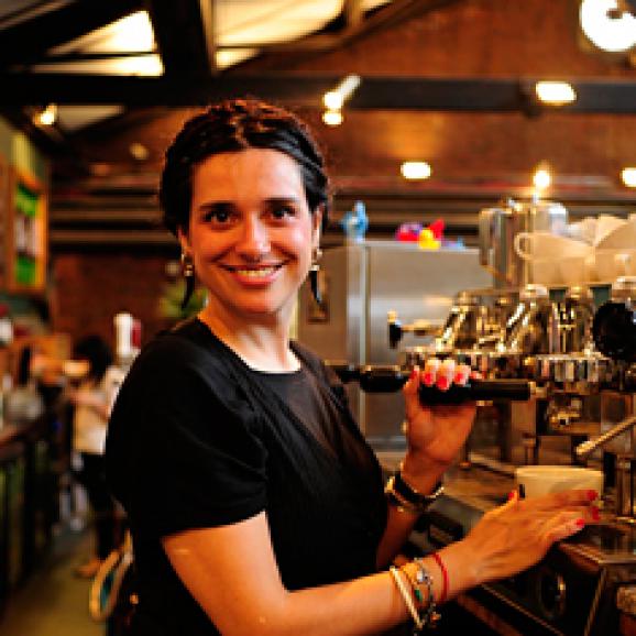 Phot of a Watershed Café & Bar team member making coffee