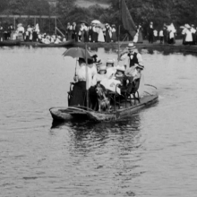 an image of people on a boat taken from Trip to Sunny Vale Gardens at Hipperholme (1901) 