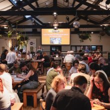 A photo of people sitting in Watershed's Cafe & Bar