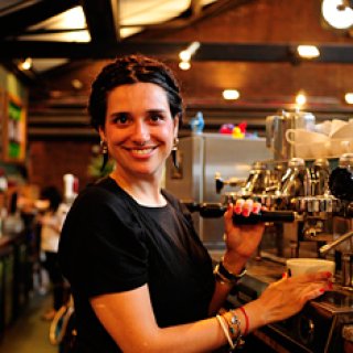 Phot of a Watershed Café & Bar team member making coffee