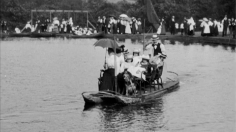 an image of people on a boat taken from Trip to Sunny Vale Gardens at Hipperholme (1901) 