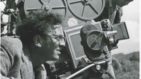 Vintage photo of Douglas Slocombe operating a movie camera