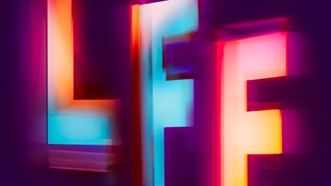 BFI London Film Festival poster featuring glowing, blurred "LFF" letters in vibrant neon colors against a dark purple background.