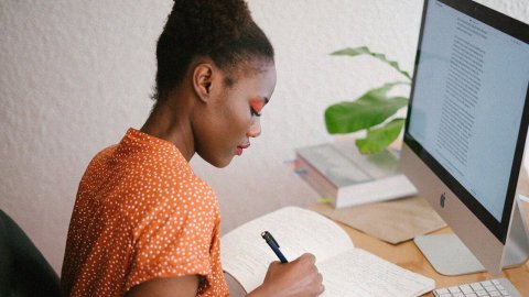 image of woman in front of computer