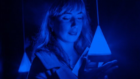 Image of a person holding a light