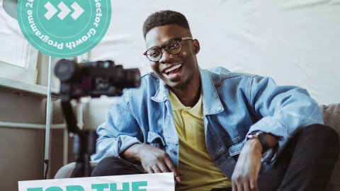 A man is smiling