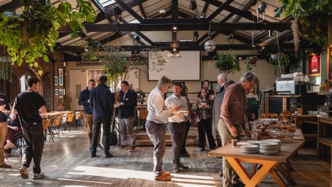 A group of people in Watershed Cafe & Bar.
