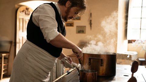 Film still of a man cooking in The Taste Of Things